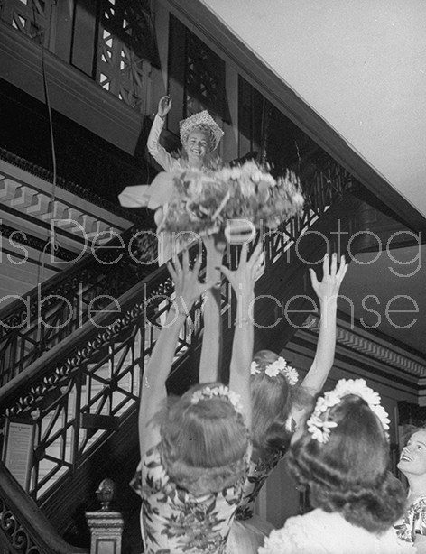 Bride throwing bouquet after wedding at West Point.