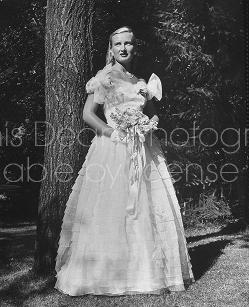 Debutante Betty Scudder wearing a long flowing dress.