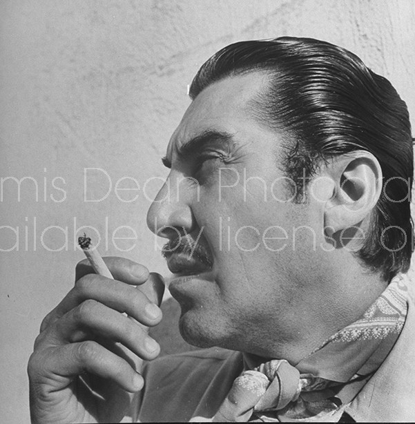 Actor, writer, director Emilio "Indio" Fernandez smoking.