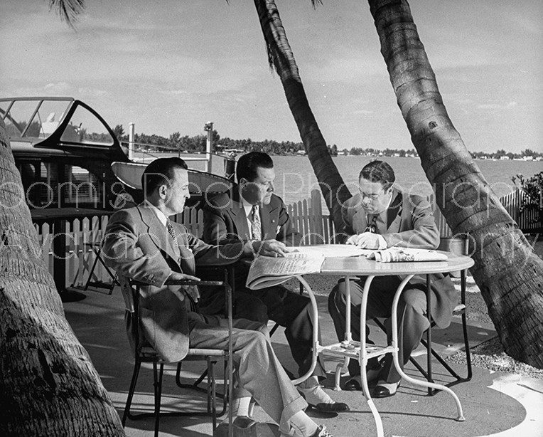Top men in new Pirates organization John W. Galbreath (L), Frank E. McKinney (C) and H. Roy Hamey sitting at table.