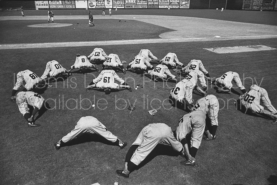 The Tokyo Giants baseball team doing some oriental exercises before playing the exhibition game against the New York Giants.