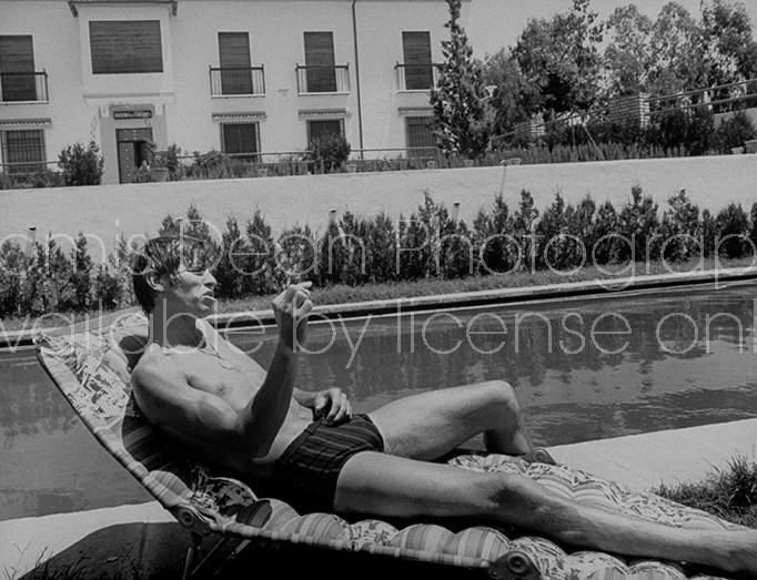 Spanish bullfighter Manuel Benitez aka El Cordobes, while relaxing by the pool.