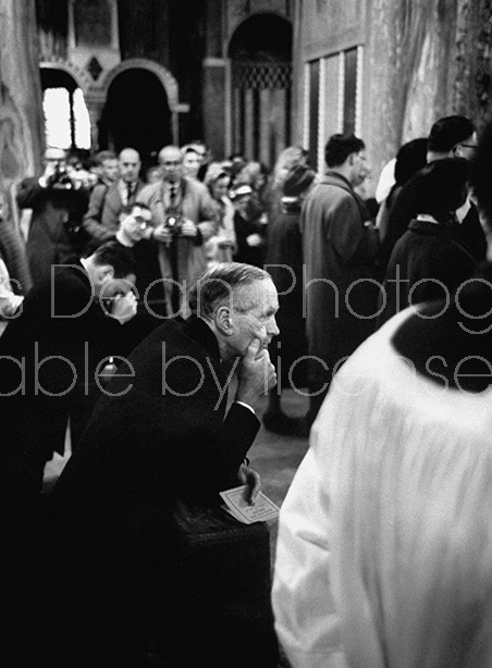 Londoners praying for John F. Kennedy inside Westminister Cathedral.