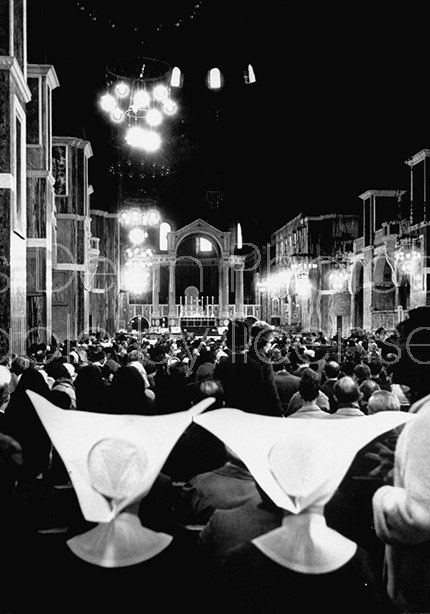 Londoners praying for John F. Kennedy after his assassination, inside Westminister Cathedral.