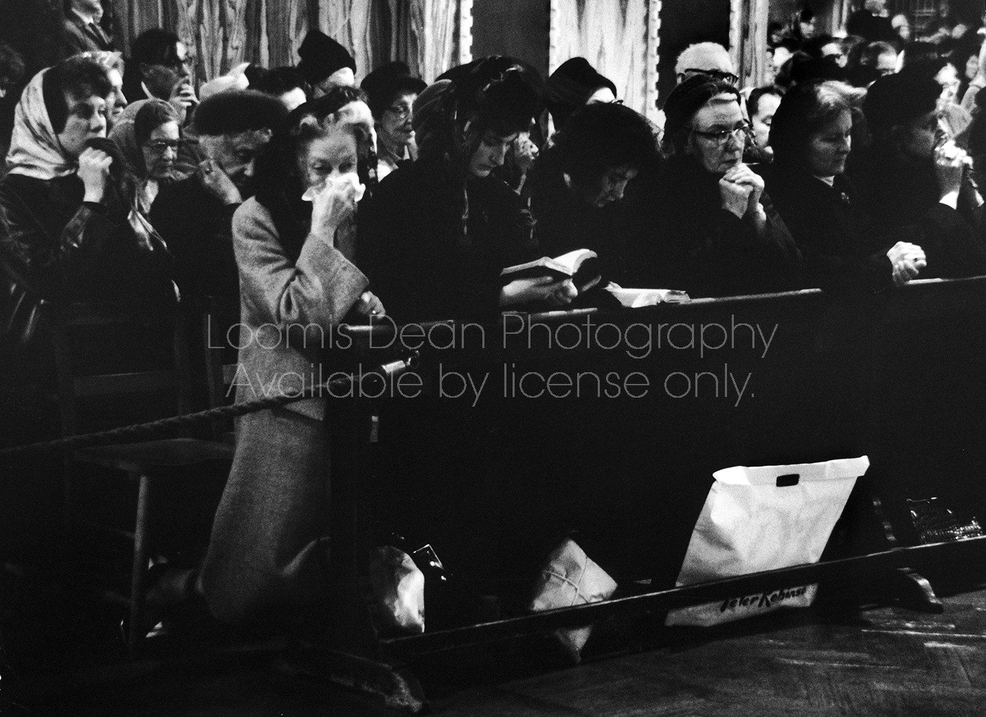 Londoners praying for John F. Kennedy, following his assassination, in Westminister Cathedral.