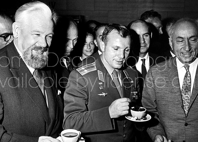 Soviet cosmonaut Yuri Gagarin (C) and others attending International Space Conference.