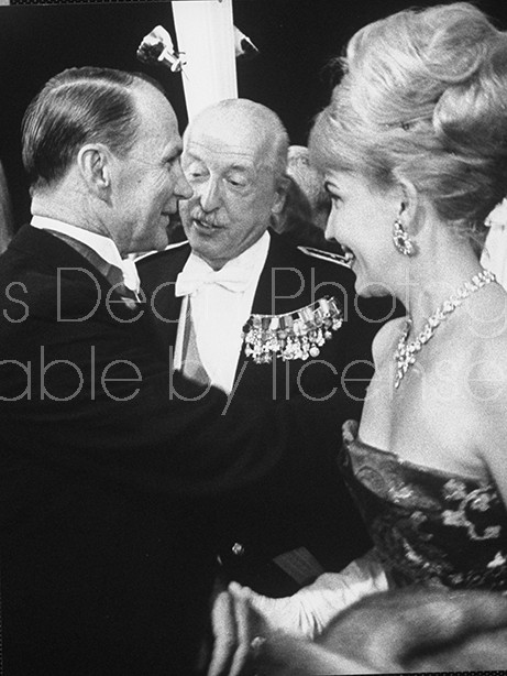 US Ambassador James Gavin and his wife (L) and General Pierre Koenig (2L), attending the world premiere of "Longest Day".