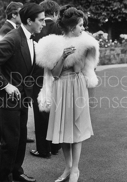 Daughter of conservative party chairman Iain Macleod,Diana Macleod (R), bidding her guests goodbye after her coming out party.