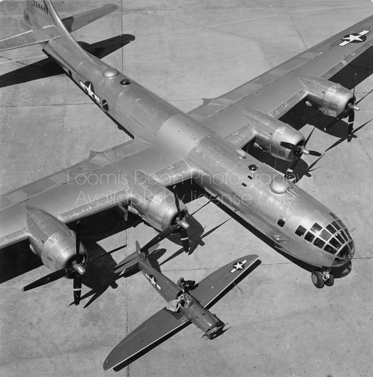 U.S. AIR FORCE B29 NEXT TO FIGHTER 245 