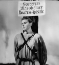 Ingrid Bergman tied to stake in her role as Joan of Arc