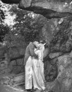Cadet kissing his bride following West Point wedding.