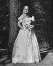 Debutante Betty Scudder wearing a long flowing dress.