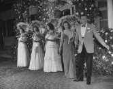 Debutantes standing with August A. Busch Jr., one of the girl's fathers.