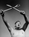 Cherokee Indian man celebrating during stickball game.