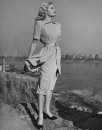 Model wearing dress designed by Jonathan Logan.