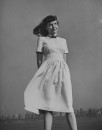 Model wearing dress designed by Jonathan Logan.