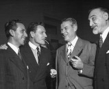 Nelson A. Rockefeller (2L), David McDonald (2R), and Jacob S. Potofsky attending US Ambassador's reception on eve of Miguel Aleman's inagural.