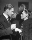 Nelson A. Rockefeller (L) attending US Ambassador's reception on eve of Miguel Aleman's inagural.