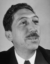Miguel Aleman wearing suit and tie during his inauguration.