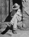 A man taking a siesta in a doorway at the Toluca Market.
