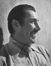 Emilio "Indio" Fernandez smiling.
