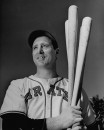 Pittsburg Pirates baseball player Hank Greenberg holding three baseball bats.
