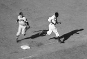 Baseball player Jackie Robinson running bases during game. Ebbets Field (prob. during opening series of season against the Boston Braves)