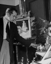Actor Vincent Price arranging unfinished still life.