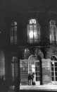 Men standing outside Paris Hotel Matignon, the official residence of the premier.