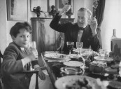 British mystery writer and author Ian Fleming eating lunch with his son Casper.