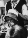 Actress Brigitte Bardot shopping for hats.