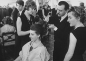 Hairdresser concentrating on art of coiffure in Carita's, famous Paris beauty salon.