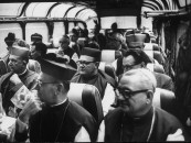 Bishops traveling by bus during visit to Rome for Ecumenical Council.