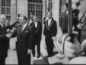 French Premier Georges Pompidou (2L) greeting Konard Adenauer (L) on his visit to France.