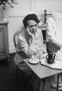 Author and columnist Elsa Maxwell breakfasting in a Ritz hotel room.