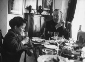 British mystery writer Ian Fleming eating lunch with his son Casper.