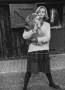 British fashion model Sandra Douglas-Home, with her sheepdog.