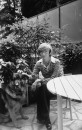 Writer Francoise Sagan posing for a picture at her home.