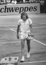 Tennis player Bjorn Borg sadly walking off the tennis court.