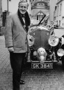 Mystery writer Ian Fleming , 54, standing next to Bentley car similar to the one useb by his novel''s hero James , two years before his death..