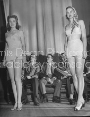 Judges sitting behind the girls during the beauty contest.