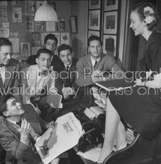 A singer sitting in the Crimson office chatting with the Crimson staff.