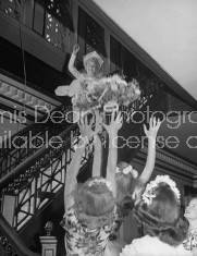 Bride throwing bouquet after wedding at West Point.
