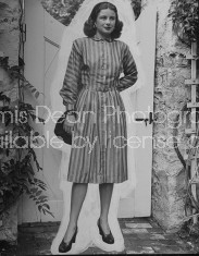 Debutante Debbie Love wearing a dress and heels.