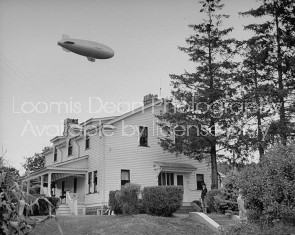 Blimp flying over home of Charles F. Kettering, at his home town celebration of his birthday.
