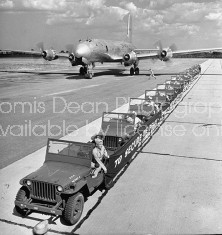 Army showing how many jeep vehicles can be fitted into a C-74 cargo plane.