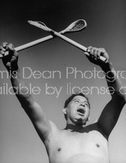 Cherokee Indian man celebrating during stickball game.