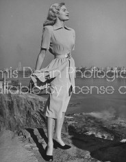 Model wearing dress designed by Jonathan Logan.