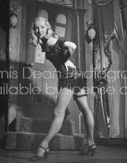 A dancer from the play "Beggar's Holiday" modeling one of the costumes.