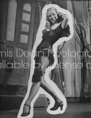 A dancer from the play "Beggar's Holiday" modeling one of the costumes.